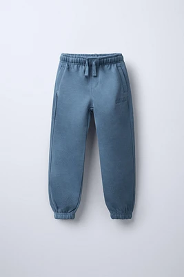 PANTALON DE JOGGING AVEC INSCRIPTION BRODÉE