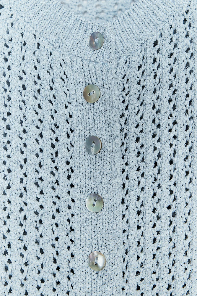 TOP EN MAILLE POINTELLE