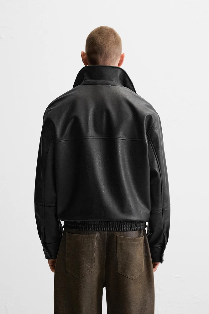 BLOUSON EN MATIÈRE SYNTHÉTIQUE