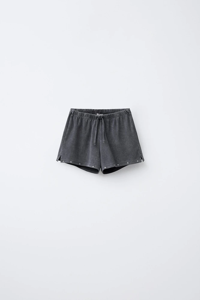 WASHED EFFECT STUDDED BERMUDA SHORTS