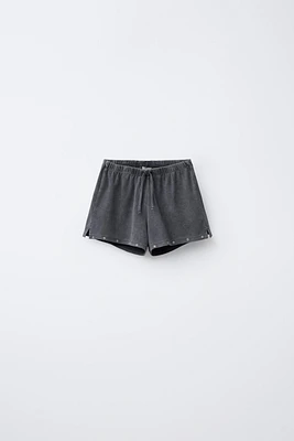 WASHED EFFECT STUDDED BERMUDA SHORTS