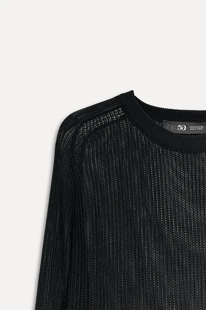 PULL EN MAILLE OUVERTE 50E ANNIVERSAIRE