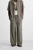 PERFORATED JACQUARD RELAXED FIT PANTS