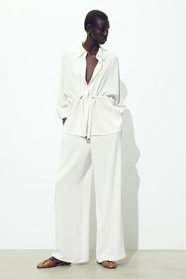 PANTALON EN CRÊPE À JAMBES LARGES