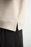 SWEAT À CAPUCHE TECHNIQUE