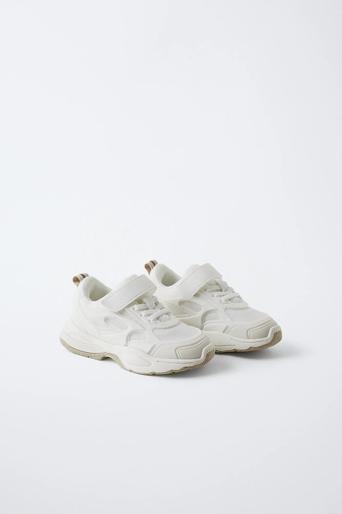 TENNIS MULTI-PIÈCES