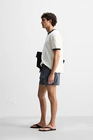 GEOMETRIC PRINT SHORT SWIMMING TRUNKS