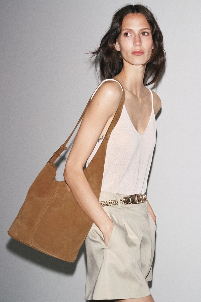 SAC SEAU SOFT ASYMÉTRIQUE EN CROÛTE DE CUIR