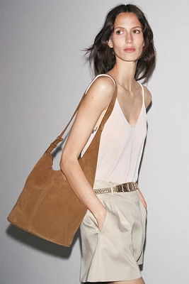 SAC SEAU SOFT ASYMÉTRIQUE EN CROÛTE DE CUIR