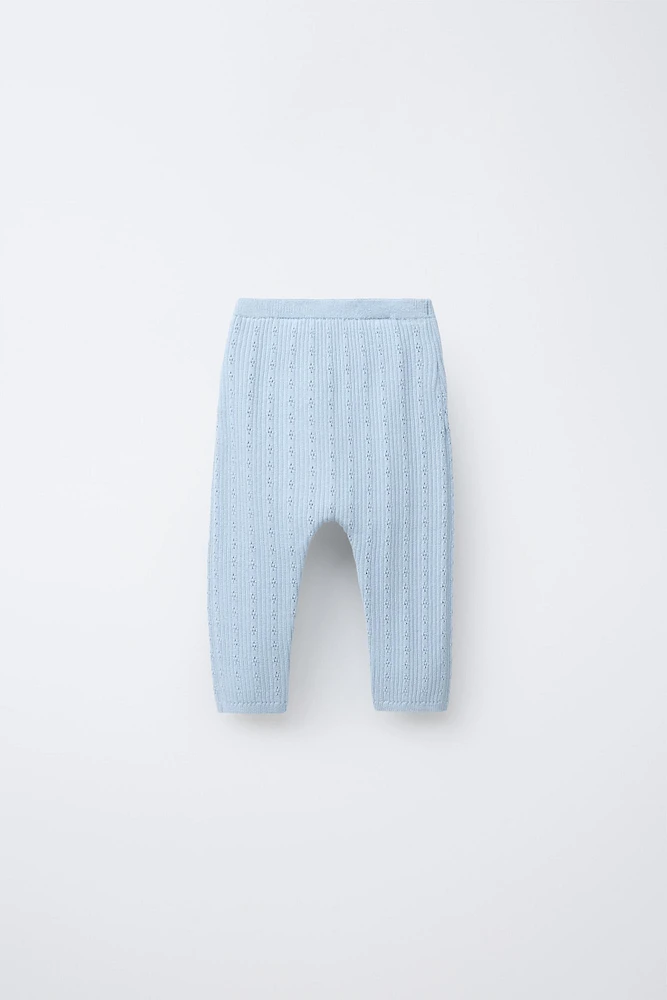 PANTALON EN MAILLE AJOURÉ