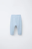 PANTALON EN MAILLE AJOURÉ