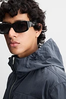 HOODED TECHNICAL JACKET