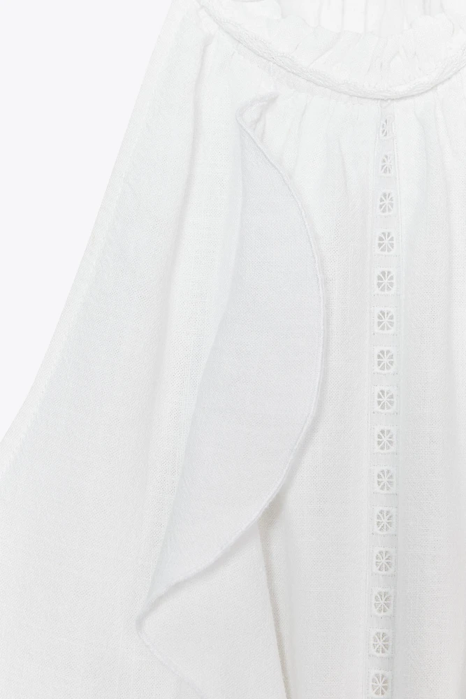 TOP HALTER VOLANTS AVEC RAMIE