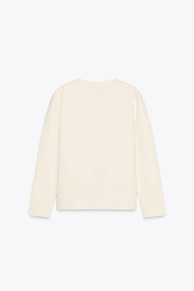 GILET EN MAILLE UNI