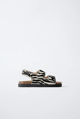 SANDALES EN CUIR ANIMAL PRINT