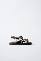 SANDALES EN CUIR ANIMAL PRINT