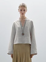 Striped satin shirt with wide hem