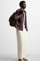 PLEATED CHINO PANTS