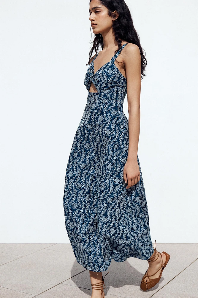 ROBE MIDI BRODERIES AJOURÉES EFFET GOMME