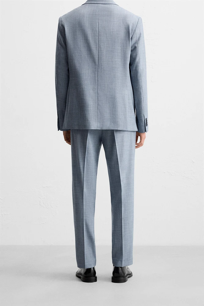 TEXTURED SUIT PANTS