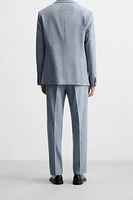TEXTURED SUIT PANTS