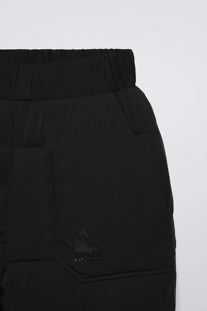 WATER REPELLENT AND WINDPROOF PADDED PANTS SKI COLLECTION