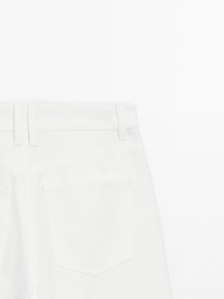Jean wide leg taille haute avec découpes