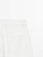 Jean wide leg taille haute avec découpes