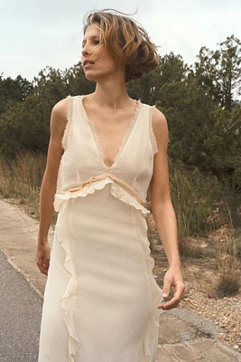 ROBE MI-LONGUE EFFRANGÉE À VOLANTS