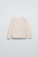 CABLE KNIT SWEATER