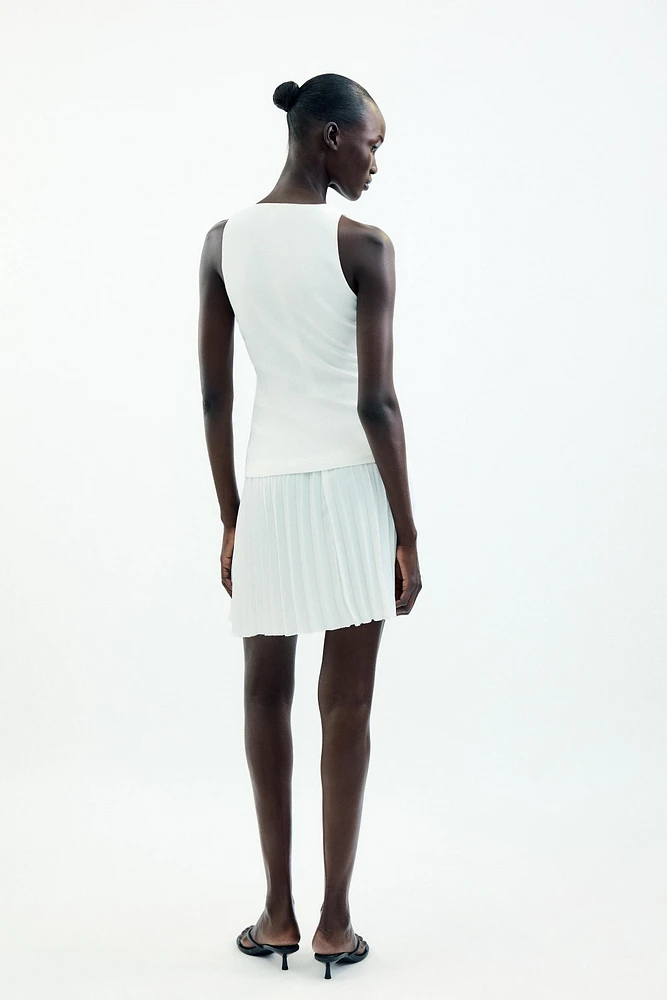 ROBE COURTE EN MATIÈRES VARIÉES
