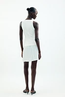 ROBE COURTE EN MATIÈRES VARIÉES