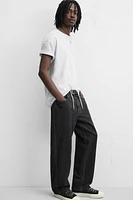 RELAXED FIT DRAWSTRING JEANS