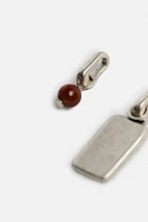 TWO-PACK OF CONTRASTING CHARMS