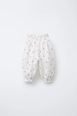 TEXTURED FLORAL PRINT PANTS