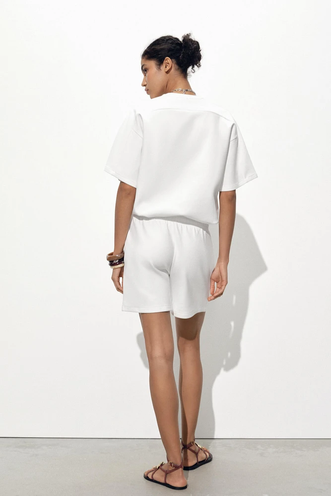SHORT EN MAILLE SURJET