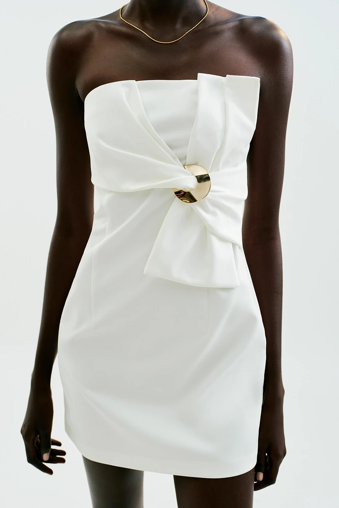 ROBE COURTE NŒUD DÉCOR DORÉ