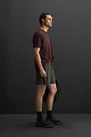 TEXTURED RUNNING SHORTS