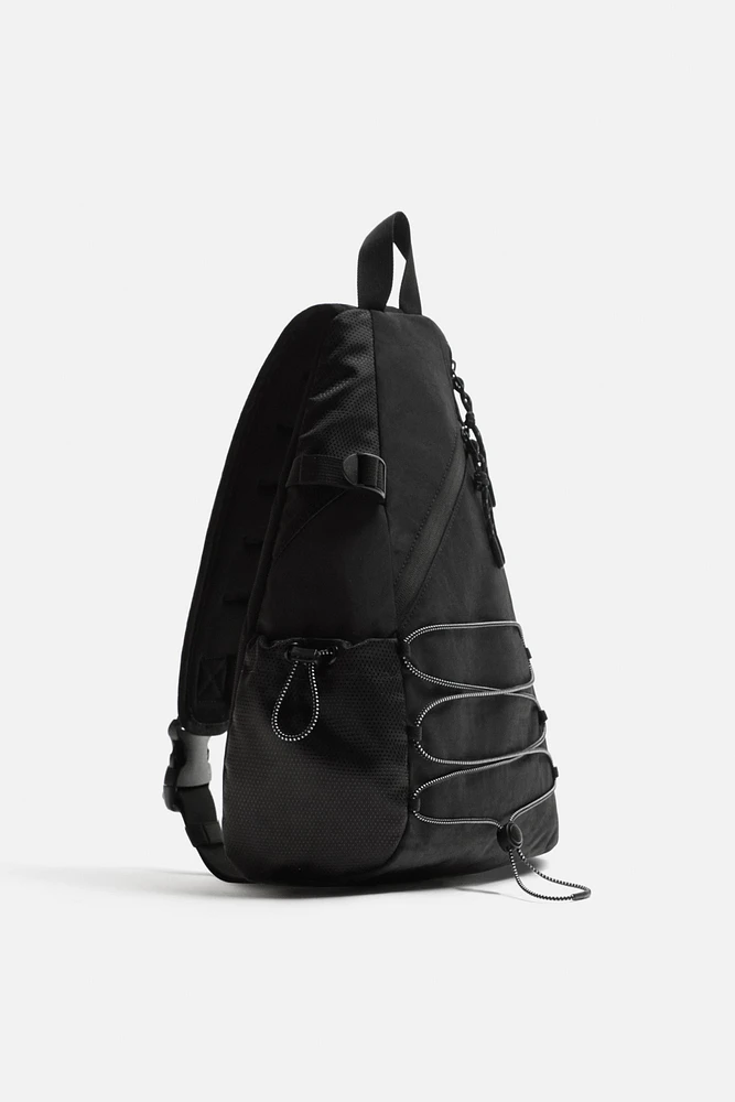 TECHNICAL CROSSBODY BACKPACK