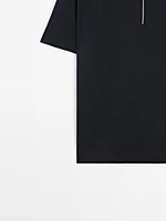 Polo en maille de coton à col zippé