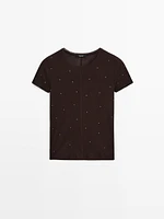 T-shirt with metal studs