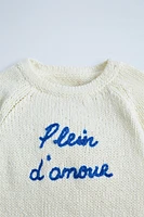 EMBROIDERED TEXT KNIT BODYSUIT