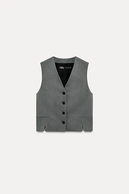 VEST WITH SLITS