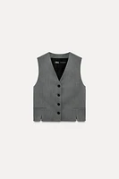 VEST WITH SLITS