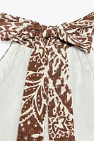 TOP À BRODERIES PERFORÉES