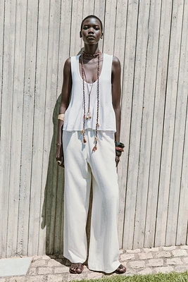 TOP EN MAILLE PÉPLUM