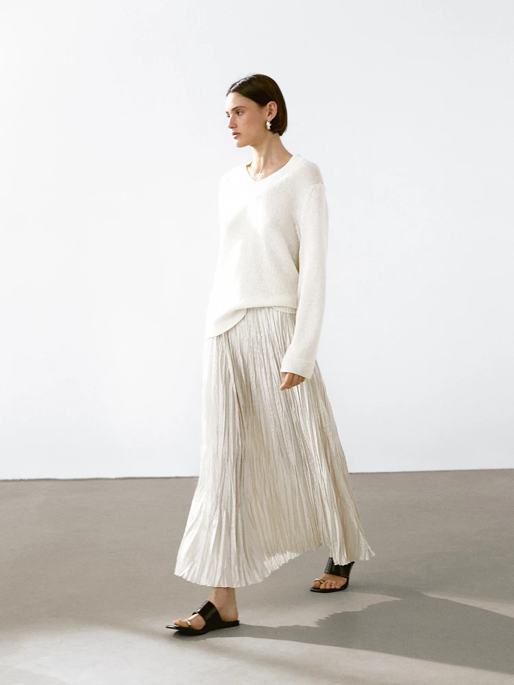 Flowing midi skirt with box pleats