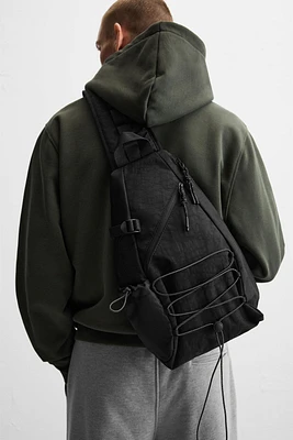 TECHNICAL CROSSBODY BACKPACK