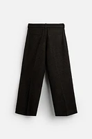 PLEATED PANTS WITH BELT X NANUSHKA