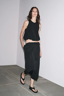 PUFFY HEM KNIT TOP